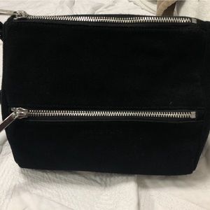 HALSTON CROSSBODY BAG .